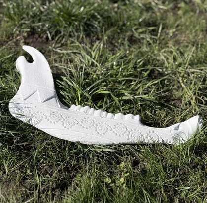 Cast mandible bone carved with a spiral design by Kristin Gentry